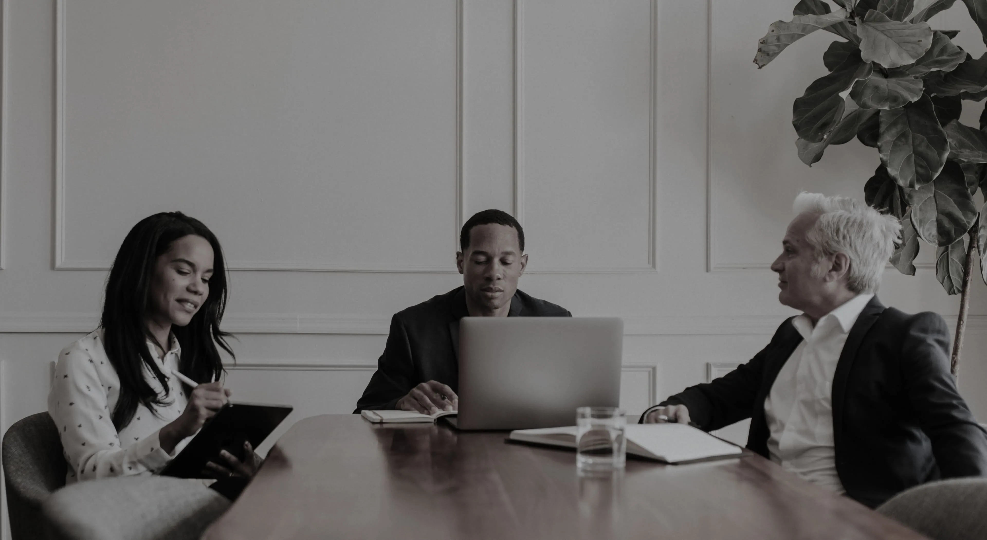 Professional team image used to support the Filerbano tax advisory homepage.